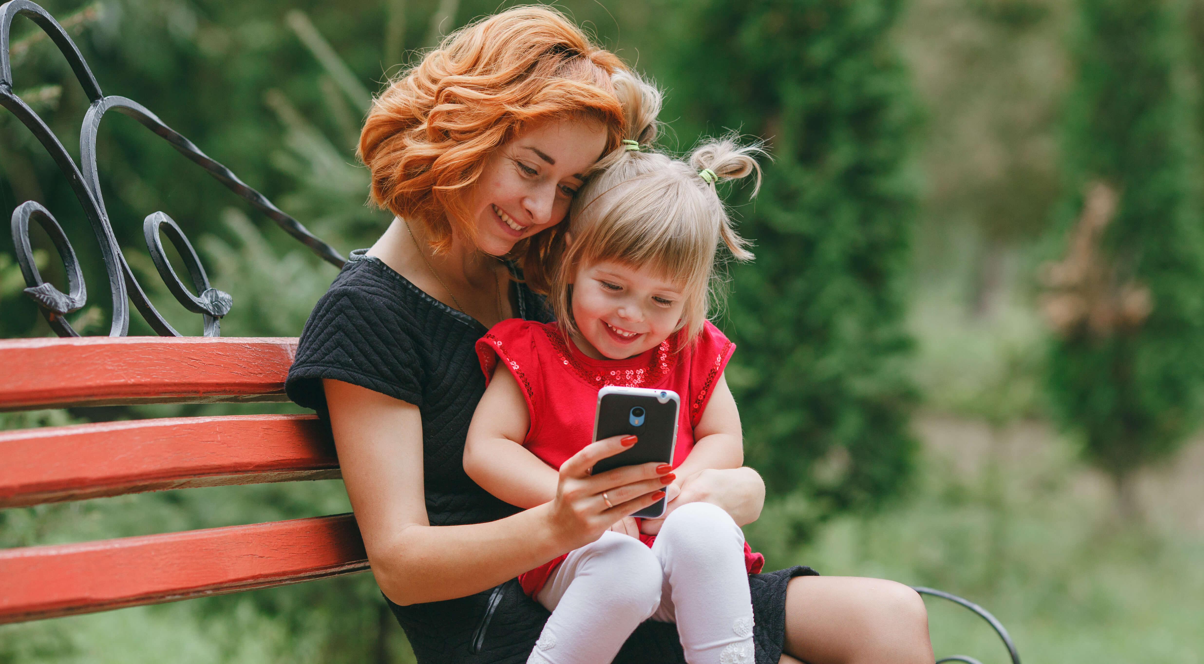 happy mother child smartphone mobile